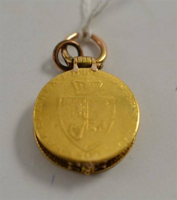 Lot 226 - A gold coin locket