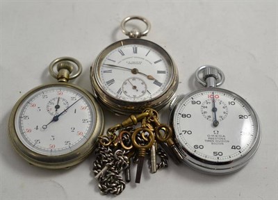 Lot 240 - A silver pocket watch, two stop watches with a quantity of keys