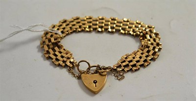 Lot 243 - A gate-link bracelet