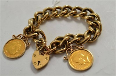 Lot 248 - A 9ct gold bracelet mounted with two sovereigns, 1911 and 1915