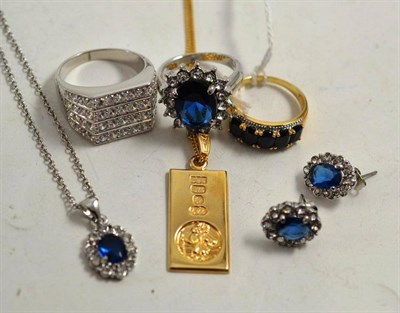 Lot 253 - A 9ct gold ingot on chain, a sapphire ring, silver and costume jewellery