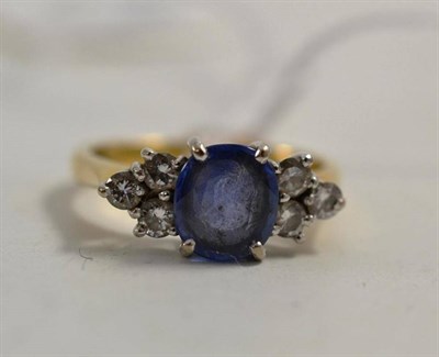 Lot 261 - A sapphire and diamond ring