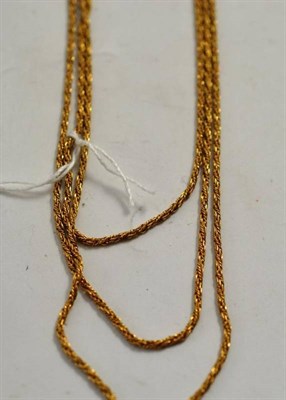 Lot 262 - A three strand gold necklace