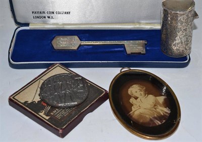 Lot 264 - A silver coming of age key in fitted case engraved Prince Charles 21st Birthday dated 1969, a...