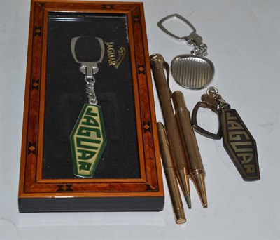 Lot 266 - A 9ct gold pencil, two rolled gold pencils and three key rings