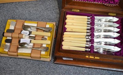 Lot 290 - A cased set of fish knives and forks with provision for eighteen knives and forks, various...