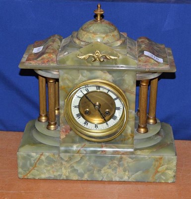 Lot 315 - A green onyx and gilt metal mantel clock