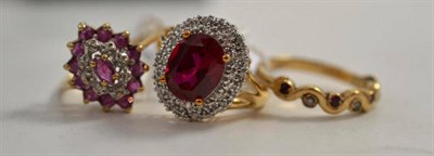 Lot 327 - A 9ct gold ruby and diamond cluster ring, a 9ct gold diamond set cluster ring and a 9ct gold...