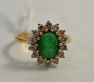 Lot 329 - An emerald and diamond ring