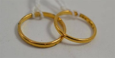 Lot 335 - Two 22ct gold band rings