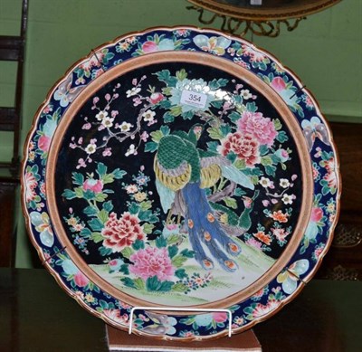 Lot 354 - A Japanese famille rose style charger