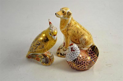 Lot 379 - Two Royal Crown Derby paperweights - Citron Cockatoo, a Labrador (with box) and a similar hen (3)