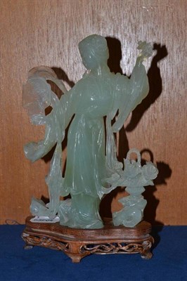 Lot 385 - A circa 1960s Chinese jade-type carved maiden on wood stand