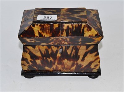 Lot 387 - A tortoiseshell tea caddy