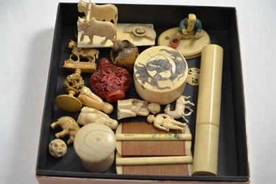 Lot 388 - A small collection of Oriental ivory including okimono, boxes and covers, chess piece etc