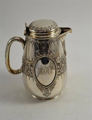 Lot 390 - A Victorian silver hot water jug