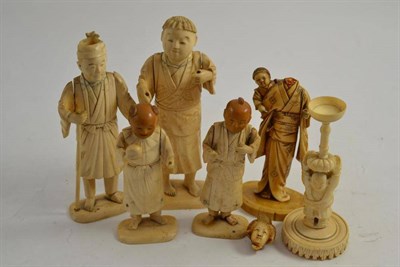 Lot 391 - Five Japanese sectional ivory figures and a puzzle ball stand (a.f.)