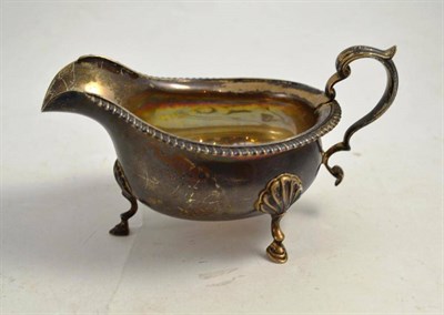 Lot 402 - A silver sauce boat