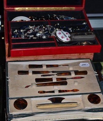 Lot 408 - A quantity of costume jewellery in two boxes