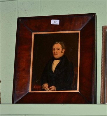 Lot 431 - A portrait of a 19th century gentleman holding a snuff box, oil on board