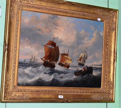 Lot 464 - English school (19th century) sailing boats in a rough sea off a coastline, oil on canvas in a gilt