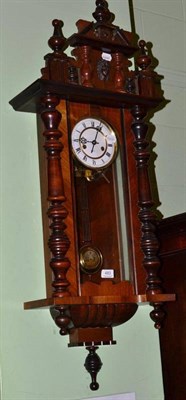 Lot 483 - A walnut Vienna style wall clock with spring driven movement