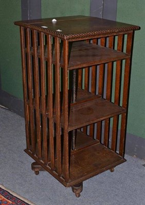 Lot 484 - An oak revolving bookcase