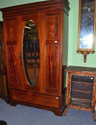 Lot 493 - A glazed bamboo sheet music cabinet and an Edwardian inlaid mahogany single door wardrobe