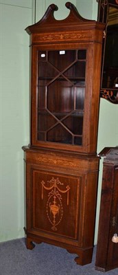 Lot 498 - Inlaid mahogany corner cupboard