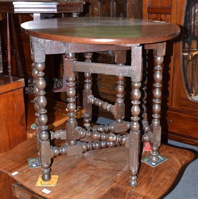 Lot 505 - A 17th/18th century small oak gate leg table