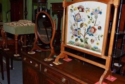 Lot 509 - A Victorian mahogany dressing stool, a needlework fire screen and toilet mirror