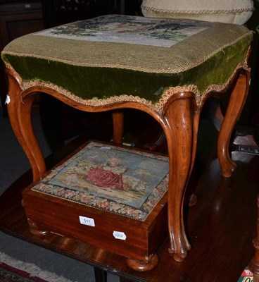 Lot 511 - A Victorian walnut dressing stool on cabriole legs and mahogany foot stool with needlework top