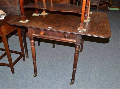 Lot 517 - An early 19th century mahogany Pembroke table with end drawer