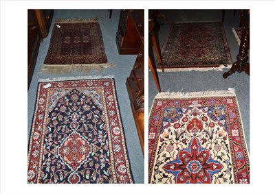 Lot 522 - Three modern Persian rugs and an Afghan rug