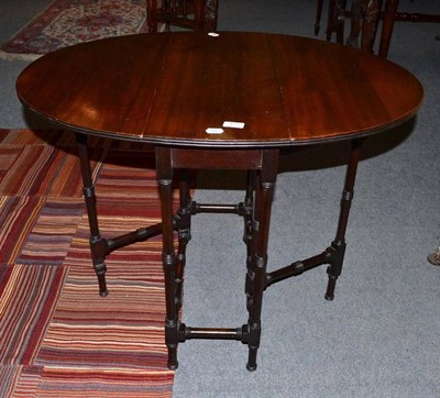 Lot 533 - A mahogany Sutherland table