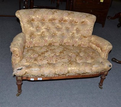 Lot 534 - A Victorian walnut framed miniature two seat settee with buttoned upholstery