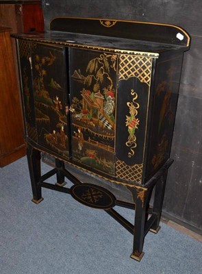 Lot 539 - A 1920's black Japanned side cabinet