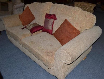 Lot 544 - A modern two seater settee and a footstool