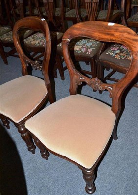 Lot 551 - A set of six Victorian mahogany balloon back dining chairs