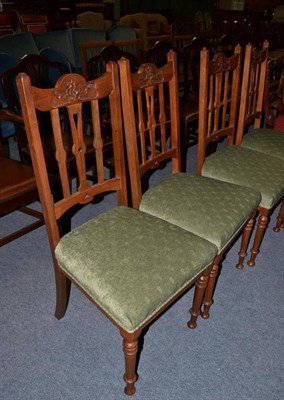 Lot 560 - Set of four Art Nouveau walnut side chairs