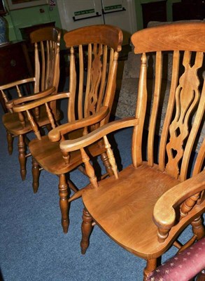 Lot 567 - A set of three modern high back Windsor chairs