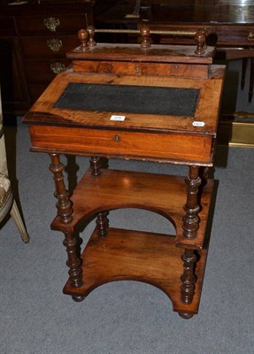 Lot 570 - A Victorian walnut davenport