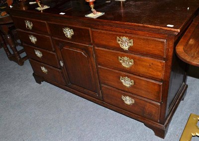 Lot 576 - Late 18th century oak dresser base with later top