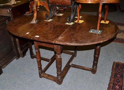 Lot 581 - Dutch oak gateleg table