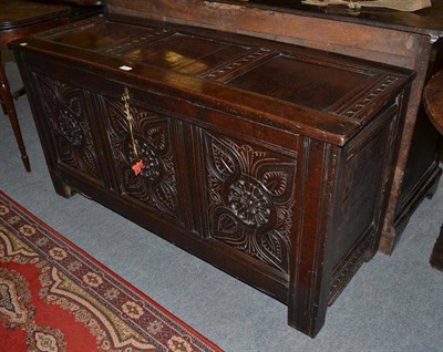 Lot 582 - A 17th century carved oak linen chest