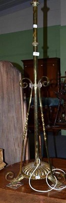 Lot 586 - A brass standard lamp converted from an oil lamp