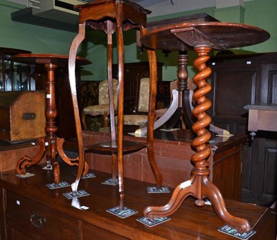 Lot 589 - Two Victorian tripod tables and a jardiniere stand