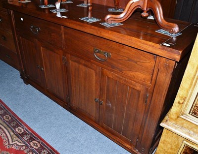 Lot 590 - An craftsman built elm sideboard