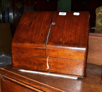 Lot 592 - A Victorian walnut stationary cabinet