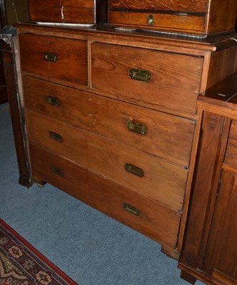 Lot 593 - A Victorian pine three height chest with inset brass handles